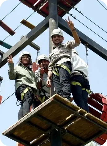 Corporate team bonding through outdoor obstacle activities